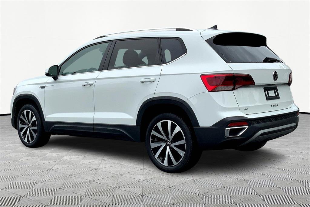 used 2023 Volkswagen Taos car, priced at $20,000