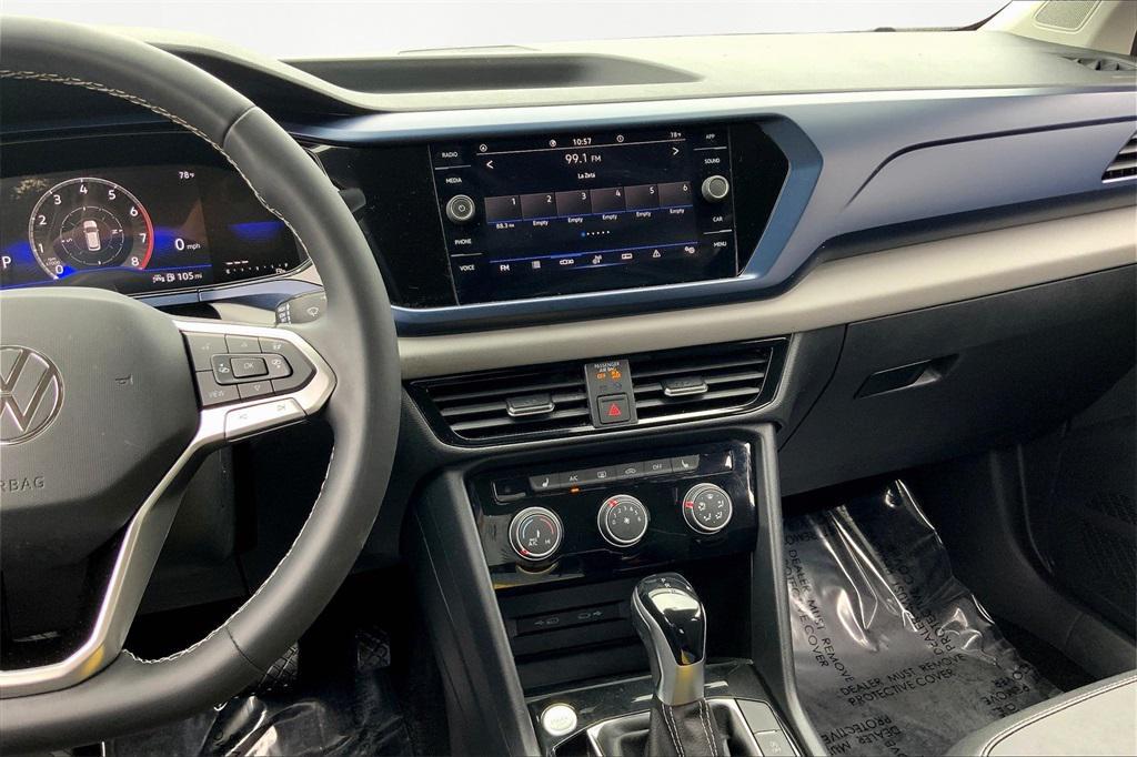 used 2023 Volkswagen Taos car, priced at $20,000