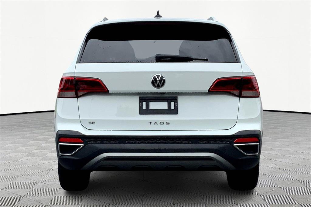 used 2023 Volkswagen Taos car, priced at $20,000