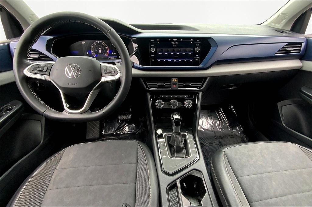 used 2023 Volkswagen Taos car, priced at $20,000