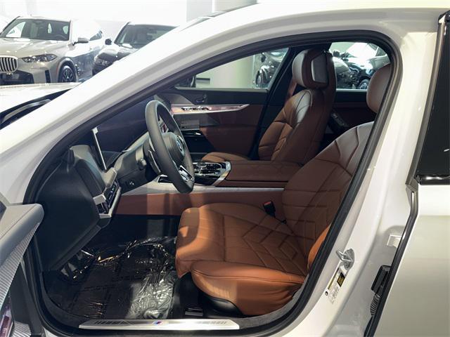 new 2025 BMW 740 car, priced at $105,985