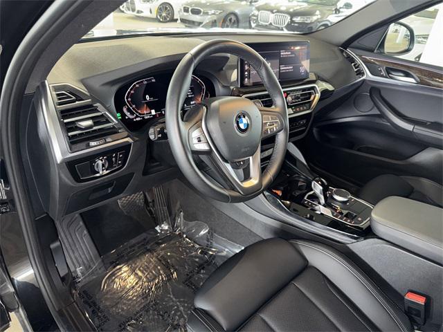 used 2024 BMW X4 car, priced at $47,900