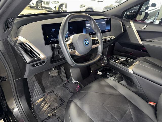 used 2024 BMW iX car, priced at $67,500