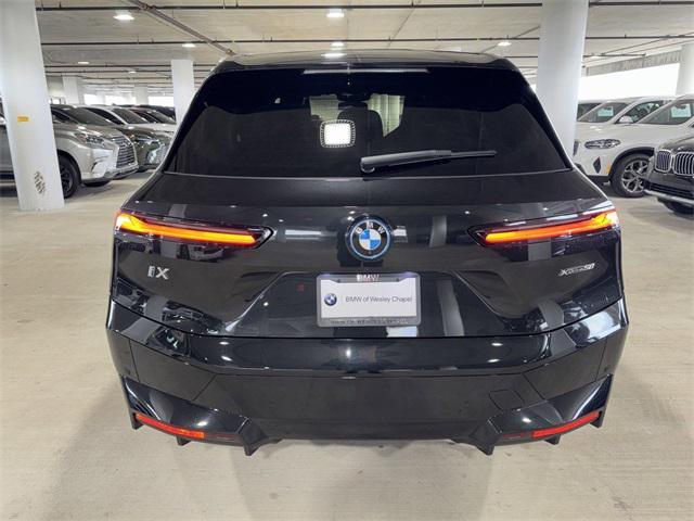 used 2024 BMW iX car, priced at $67,500