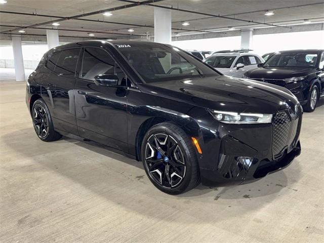 used 2024 BMW iX car, priced at $67,500