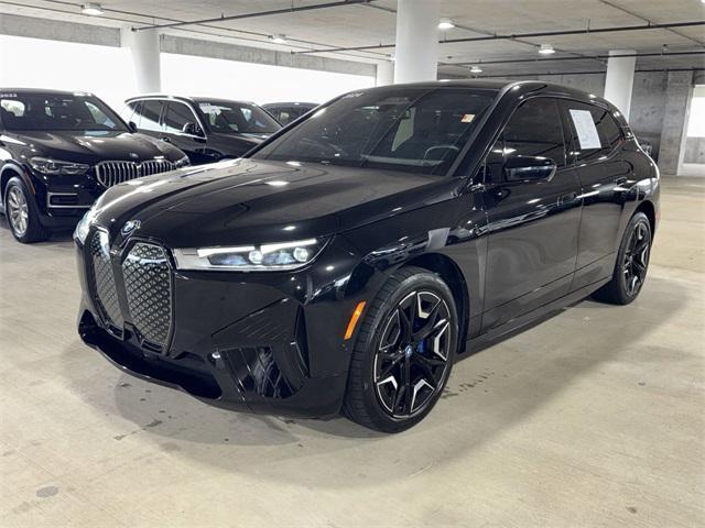 used 2024 BMW iX car, priced at $67,500