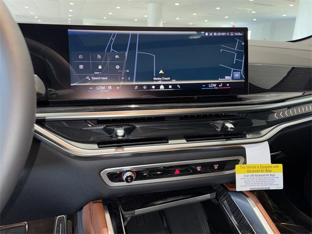 new 2026 BMW X6 car, priced at $90,525