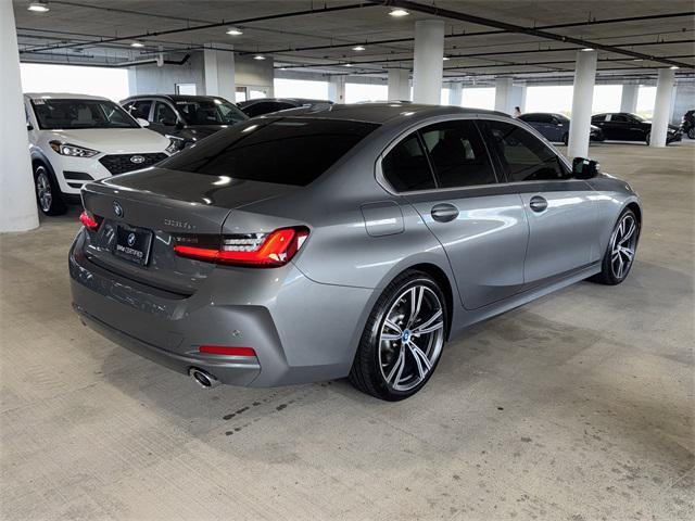 used 2024 BMW 330e car, priced at $41,228