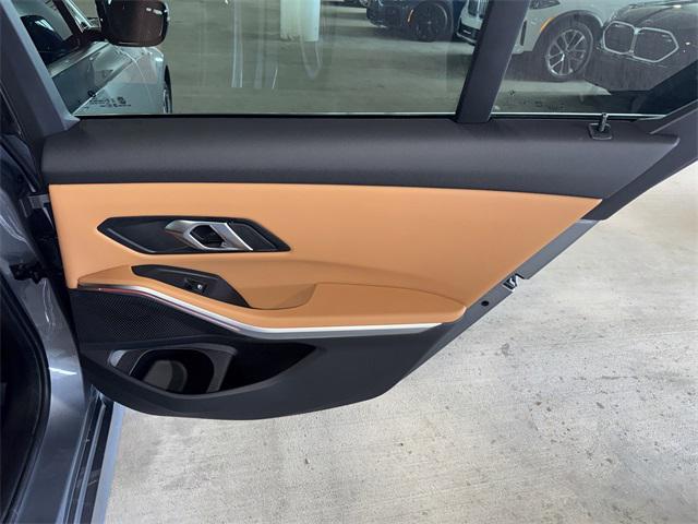 used 2024 BMW 330e car, priced at $41,228