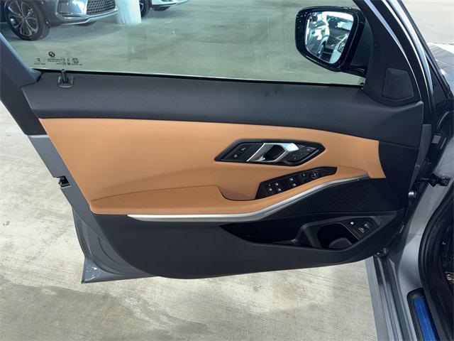 used 2024 BMW 330e car, priced at $41,228