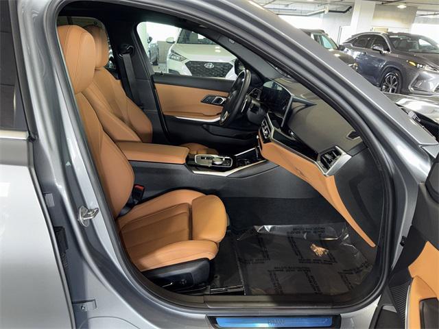 used 2024 BMW 330e car, priced at $41,228