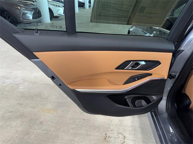 used 2024 BMW 330e car, priced at $41,228