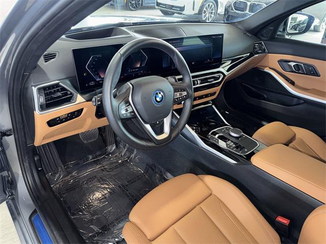 used 2024 BMW 330e car, priced at $41,228