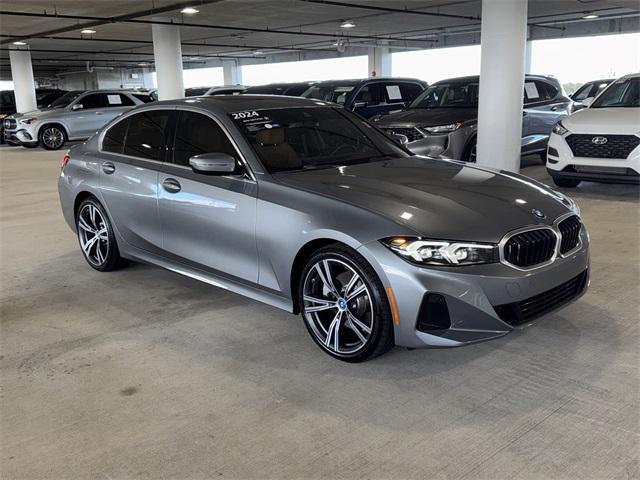 used 2024 BMW 330e car, priced at $41,228
