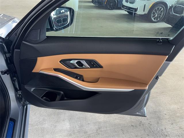 used 2024 BMW 330e car, priced at $41,228