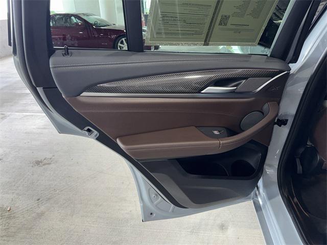 used 2024 BMW X4 car, priced at $60,500
