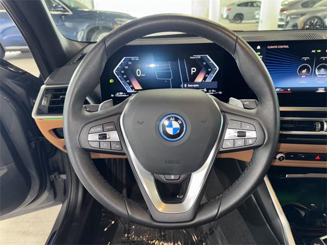 used 2024 BMW 330e car, priced at $46,000