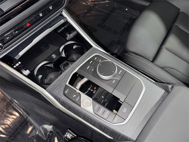 new 2025 BMW 330 car, priced at $50,095
