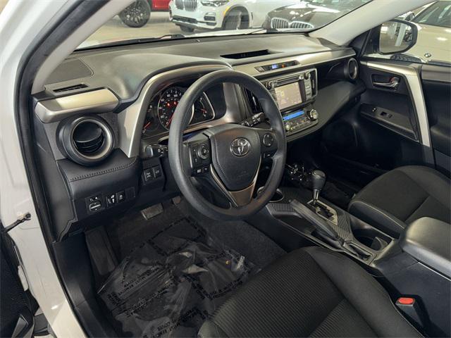used 2015 Toyota RAV4 car, priced at $14,300