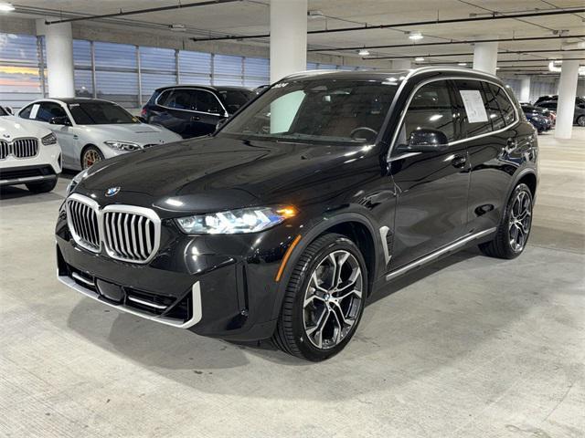 used 2024 BMW X5 car, priced at $64,800