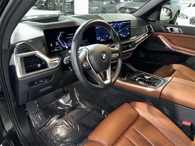 used 2024 BMW X5 car, priced at $64,800