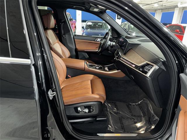 used 2024 BMW X5 car, priced at $64,800