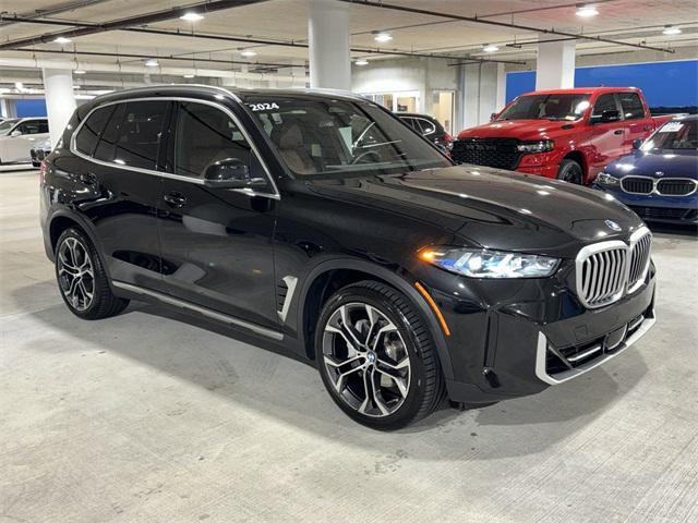 used 2024 BMW X5 car, priced at $64,800