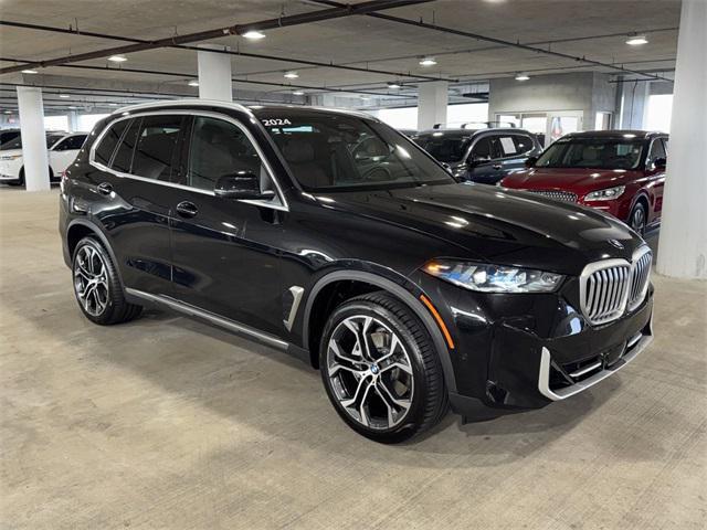 used 2024 BMW X5 car, priced at $61,800