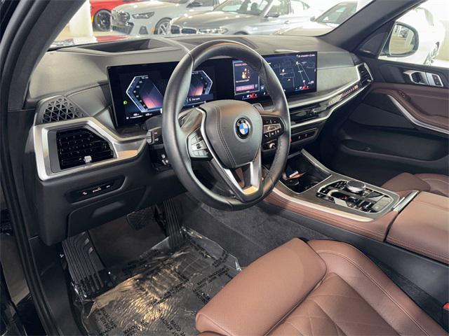 used 2024 BMW X5 car, priced at $61,800