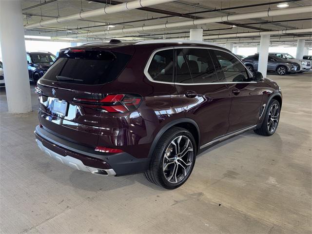 used 2025 BMW X5 car, priced at $70,352