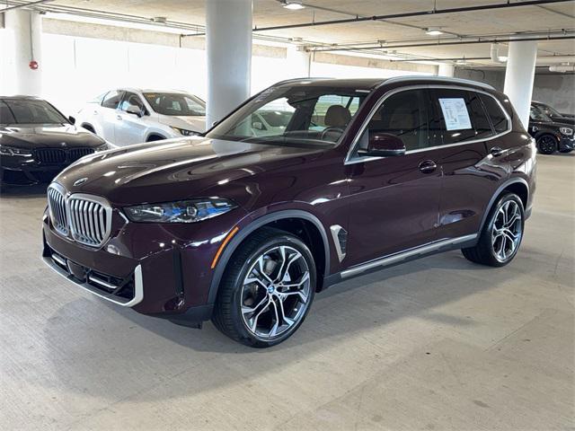 used 2025 BMW X5 car, priced at $70,352