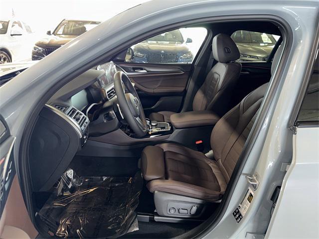 new 2025 BMW X4 car, priced at $65,600