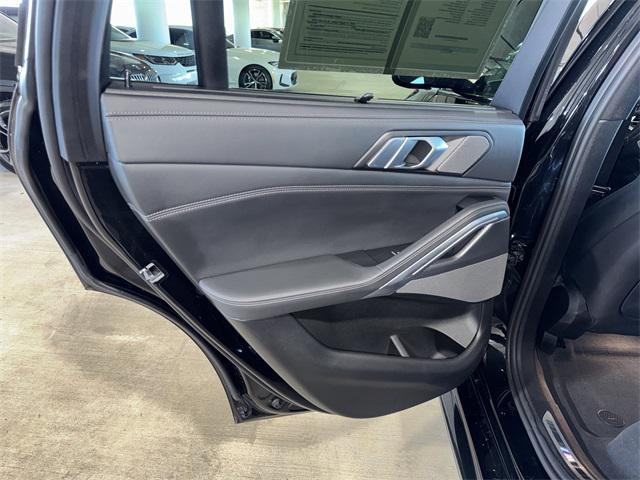 used 2023 BMW X6 car, priced at $64,837