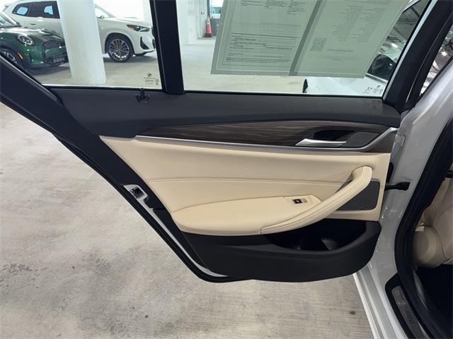 used 2023 BMW 530e car, priced at $43,607