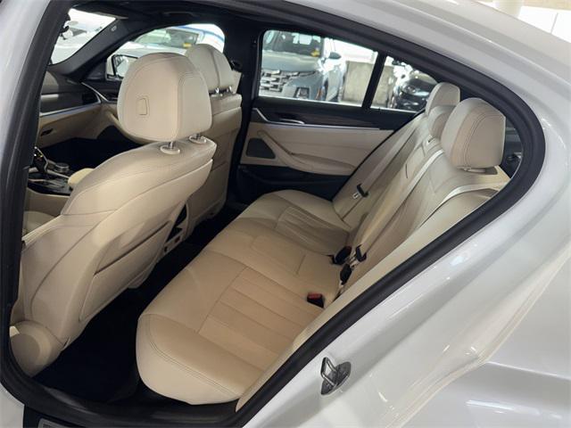 used 2023 BMW 530e car, priced at $43,607