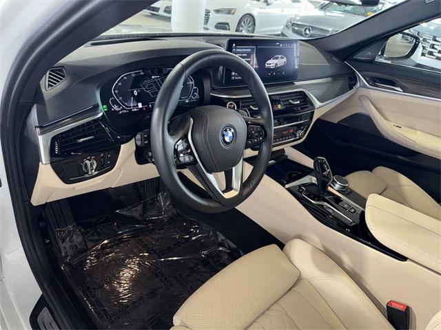 used 2023 BMW 530e car, priced at $43,607