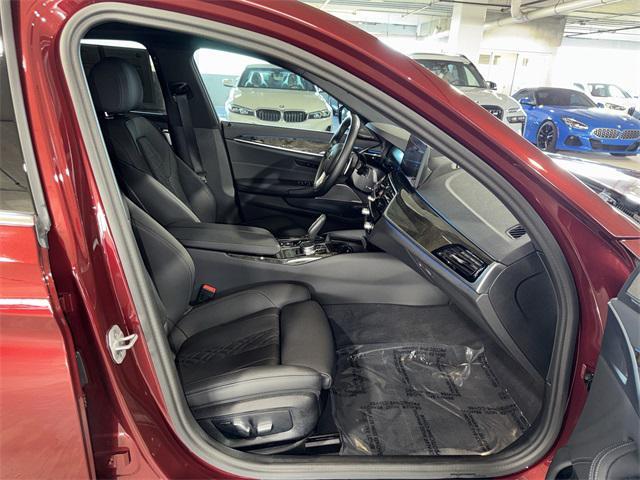 used 2023 BMW 530e car, priced at $38,356