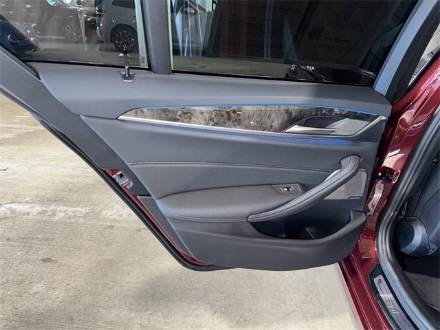 used 2023 BMW 530e car, priced at $38,356