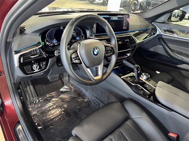 used 2023 BMW 530e car, priced at $38,356