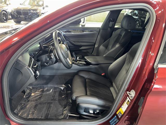 used 2023 BMW 530e car, priced at $38,356