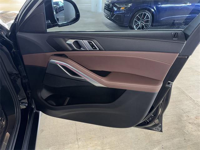used 2022 BMW X6 car, priced at $58,200