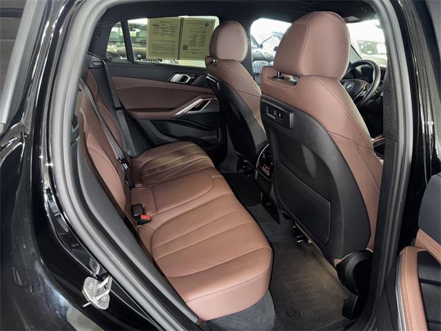 used 2022 BMW X6 car, priced at $58,200