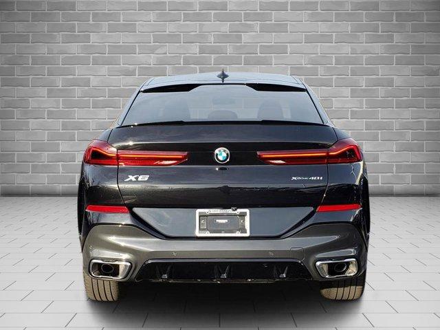 used 2023 BMW X6 car, priced at $57,748