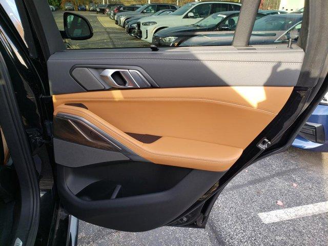 used 2023 BMW X6 car, priced at $57,748