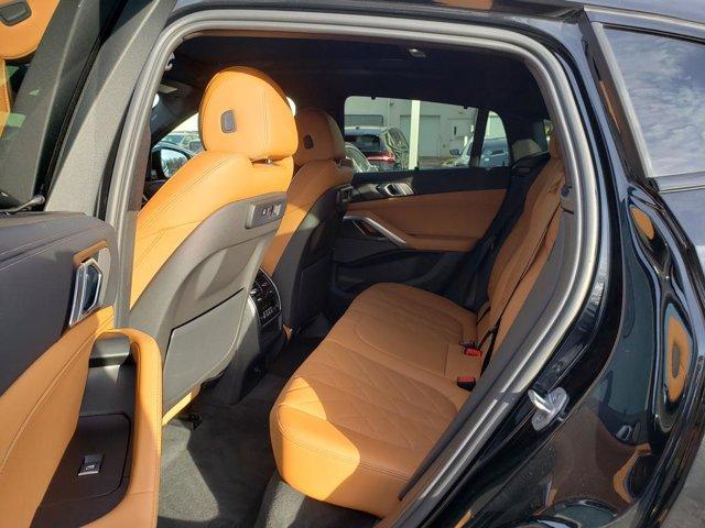 used 2023 BMW X6 car, priced at $57,748