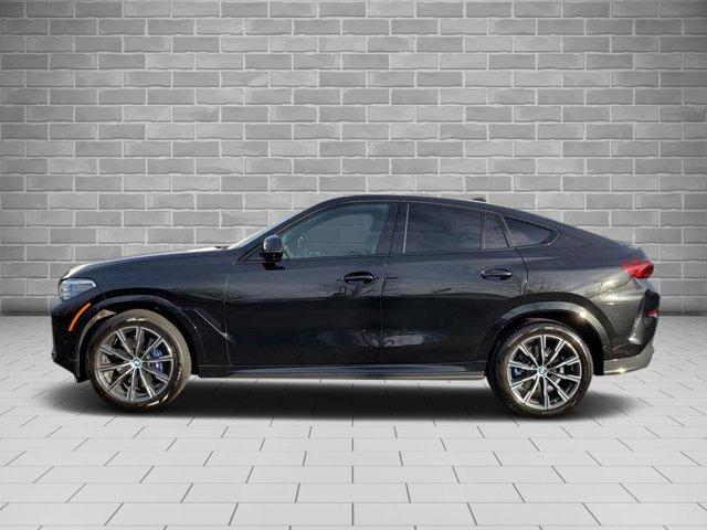 used 2023 BMW X6 car, priced at $57,748