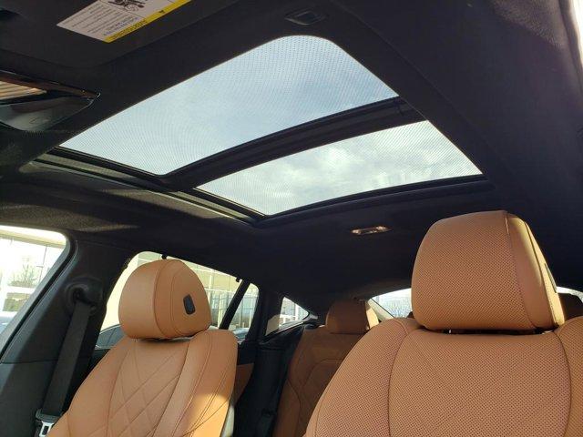 used 2023 BMW X6 car, priced at $57,748