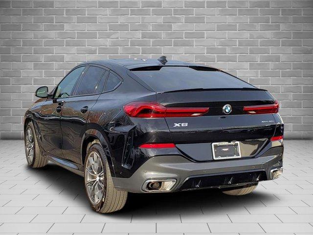 used 2023 BMW X6 car, priced at $57,748