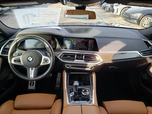 used 2023 BMW X6 car, priced at $57,748