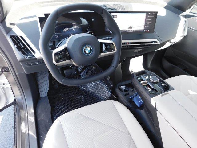 new 2024 BMW iX car, priced at $98,545